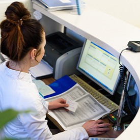 Receptionist at a desk