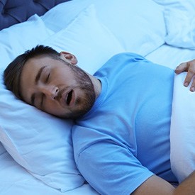 Man sleeping with his mouth open