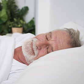 Man sleeping in bed