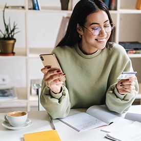 Woman using a credit card