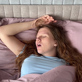 Woman sleeping with her mouth open