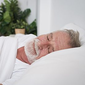 Man sleeping in bed