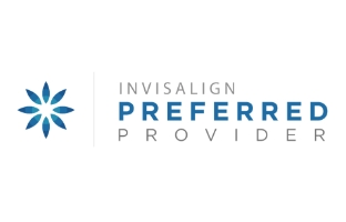 Woman placing Invisalign tray